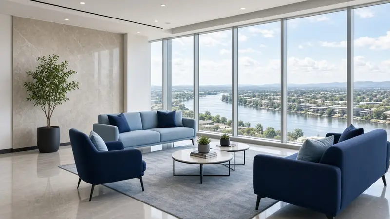 Illustration: a lounge with navy sofas and a river view